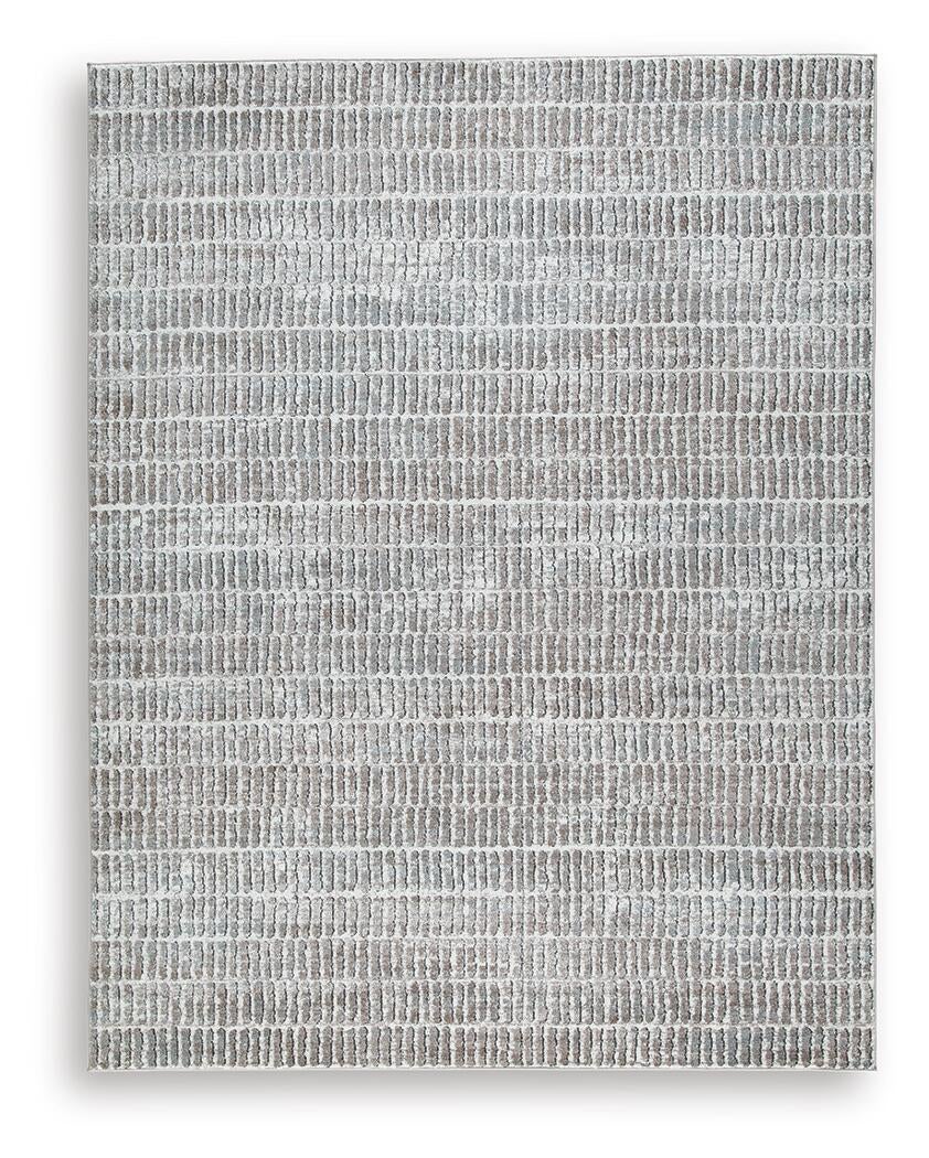 Fuadwick 5'3" x 7' Area Rug