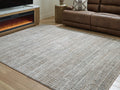 Fuadwick 5'3" x 7' Area Rug
