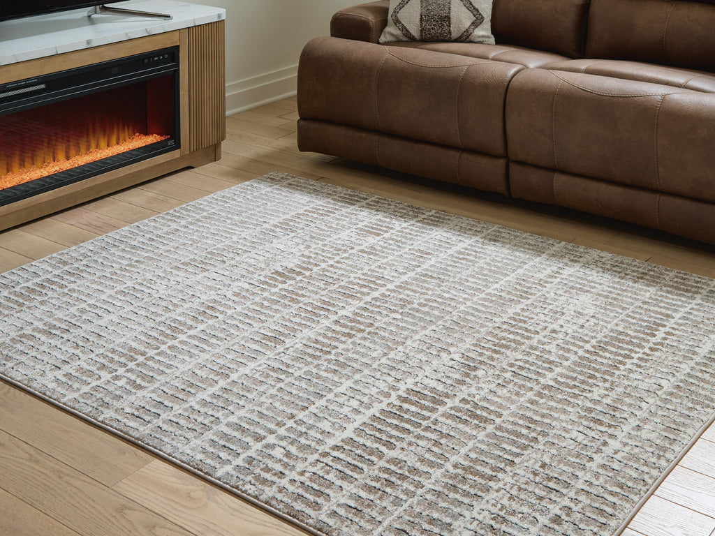 Fuadwick 7'10" x 10' Area Rug